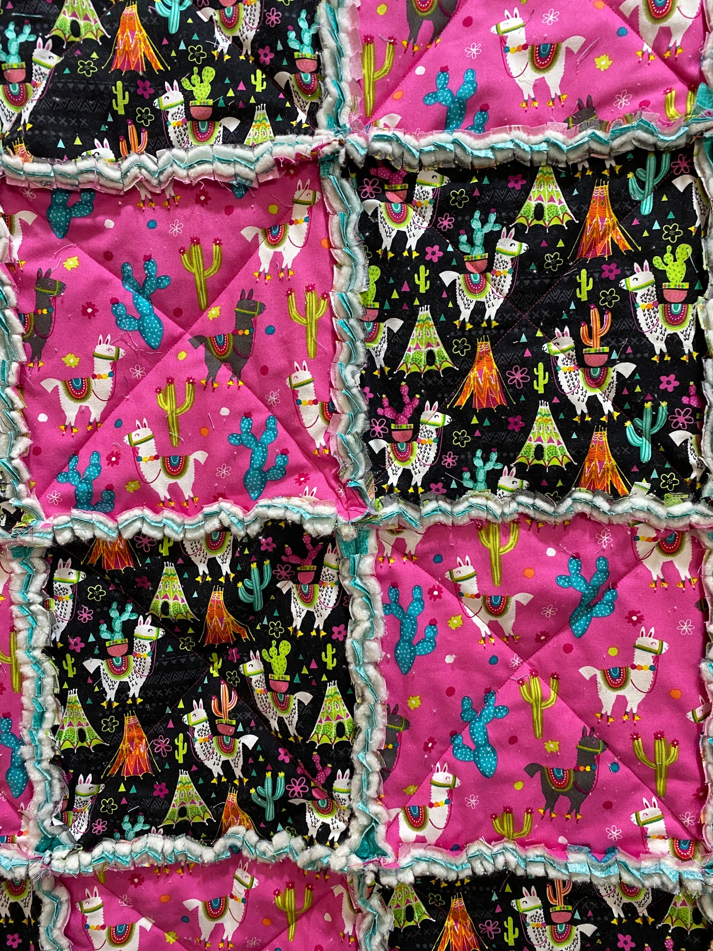 Quilt. Rag Quilt. Pink and Black Alpacas.